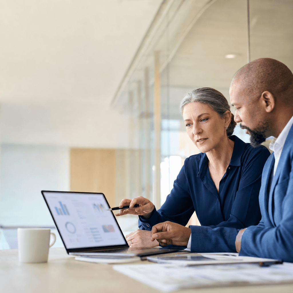 Analyst reviewing live employee engagement dashboards and PEACE scores